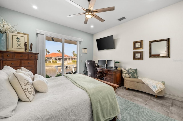 bedroom with access to outside and ceiling fan