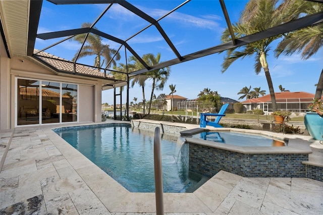 view of swimming pool featuring an in ground hot tub, pool water feature, a patio area, and a lanai