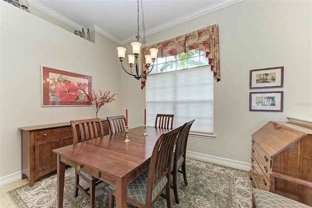 dining room featuring ornamental molding and a chandelier