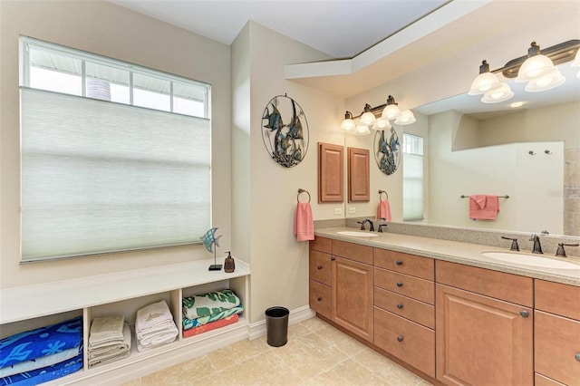 bathroom featuring tile patterned floors and vanity