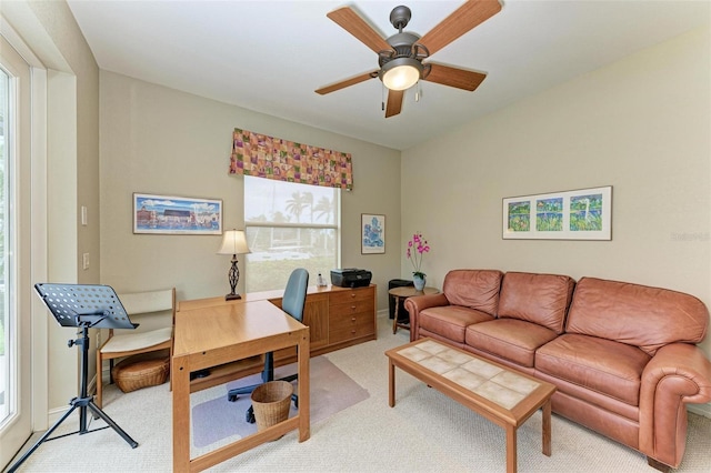 office space with carpet flooring and ceiling fan