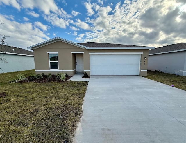 single story home with a garage and a front yard