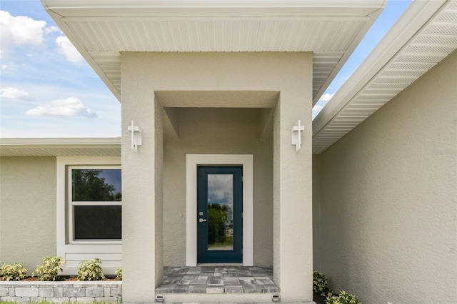 18854 Ackerman Ave, Port Charlotte, FL 33948 - property entrance with stucco siding