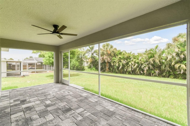 18854 Ackerman Ave, Port Charlotte, FL 33948 - unfurnished sunroom with a ceiling fan