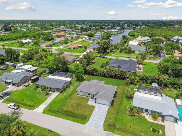 18854 Ackerman Ave, Port Charlotte, FL 33948 - aerial perspective of suburban area featuring a large body of water