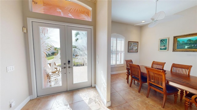 interior space with french doors and light tile patterned floors