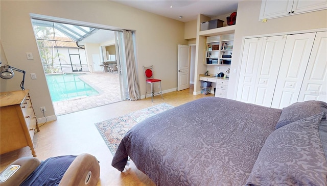 bedroom featuring a closet and light colored carpet