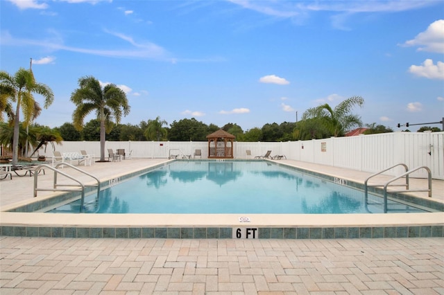 view of pool with a gazebo and a patio area