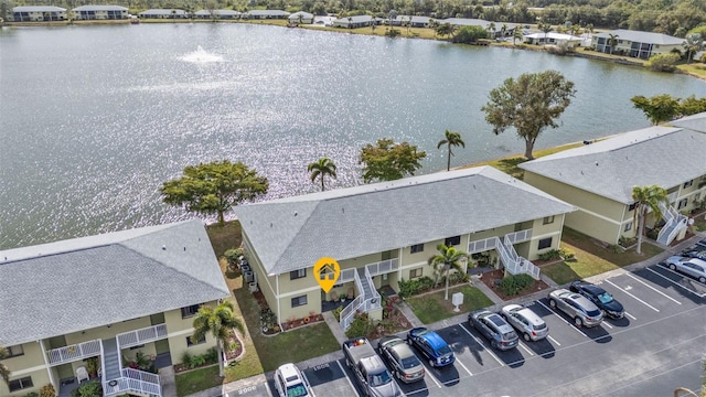 bird's eye view with a water view