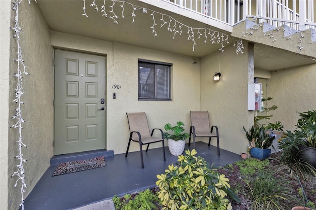 doorway to property featuring a balcony