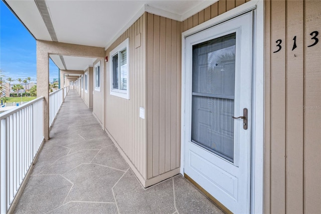 entrance to property featuring a balcony