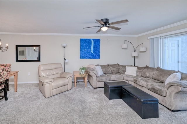 living room with carpet, ceiling fan with notable chandelier, and ornamental molding