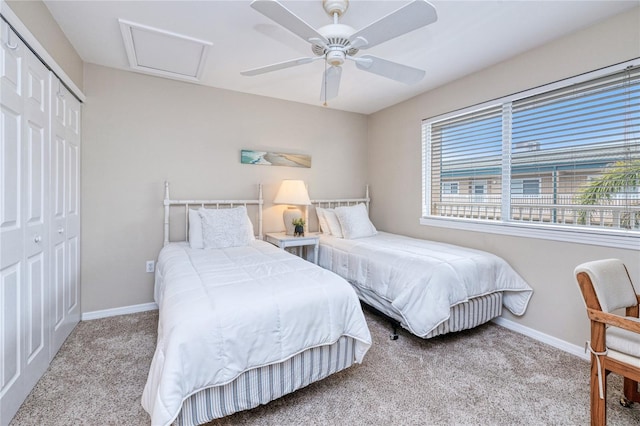 bedroom featuring light carpet, a closet, and ceiling fan