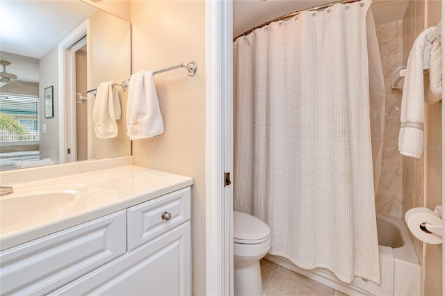 full bathroom featuring tile patterned flooring, vanity, toilet, and shower / tub combo with curtain