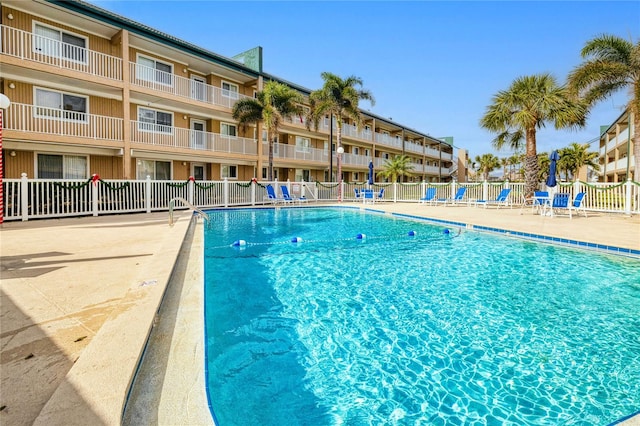 view of swimming pool featuring a patio