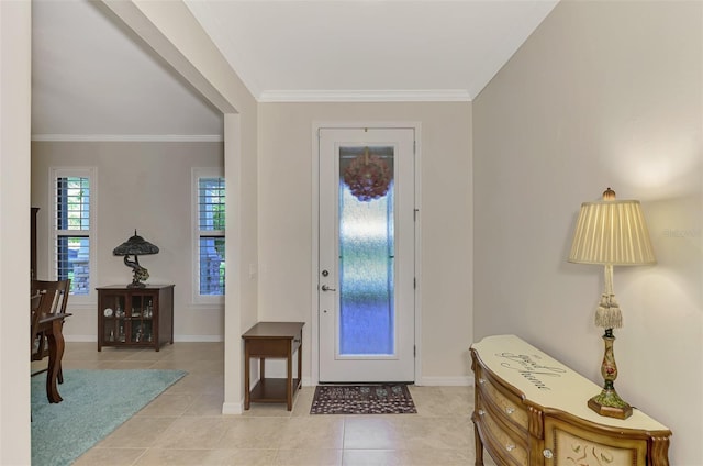 tiled foyer with crown molding