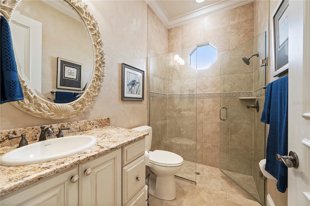 bathroom with an enclosed shower, crown molding, vanity, and toilet