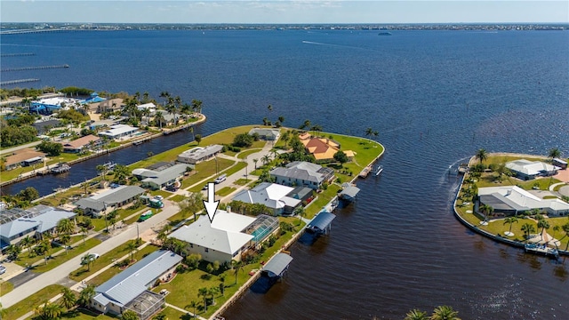 drone / aerial view with a water view