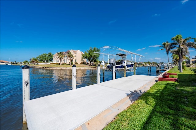 4431 Gardner Dr, Port Charlotte, FL 33952 - dock featuring boat lift and a water view