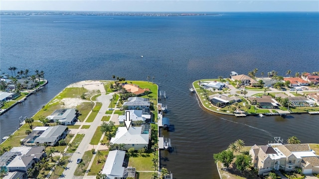 4431 Gardner Dr, Port Charlotte, FL 33952 - aerial view of property's location with nearby suburban area and a large body of water