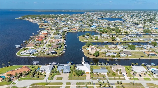 4431 Gardner Dr, Port Charlotte, FL 33952 - aerial view of property and surrounding area featuring a nearby body of water and nearby suburban area