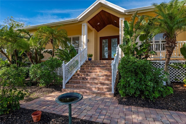 4431 Gardner Dr, Port Charlotte, FL 33952 - property entrance with french doors and a porch