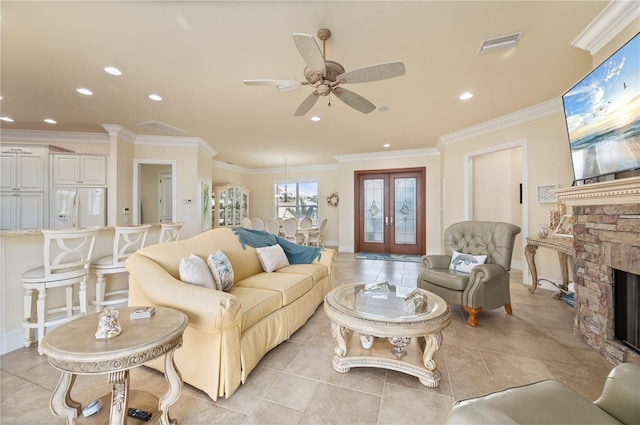 4431 Gardner Dr, Port Charlotte, FL 33952 - living area with a fireplace, ceiling fan, ornamental molding, recessed lighting, and french doors