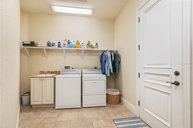 4431 Gardner Dr, Port Charlotte, FL 33952 - laundry room featuring cabinet space and washer and dryer