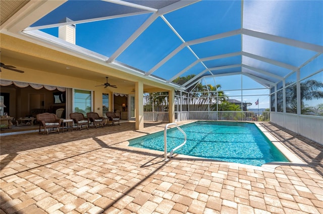 4431 Gardner Dr, Port Charlotte, FL 33952 - view of swimming pool featuring ceiling fan, a patio area, and glass enclosure