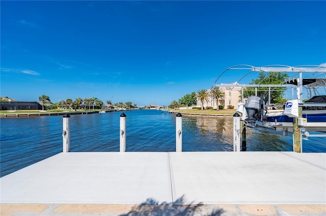 4431 Gardner Dr, Port Charlotte, FL 33952 - dock area featuring a water view and boat lift
