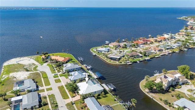 4431 Gardner Dr, Port Charlotte, FL 33952 - aerial view of property and surrounding area featuring a large body of water and nearby suburban area