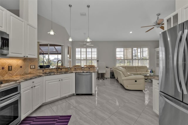 kitchen with white cabinets, sink, and stainless steel appliances