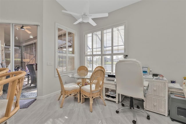 home office with ceiling fan and a wealth of natural light