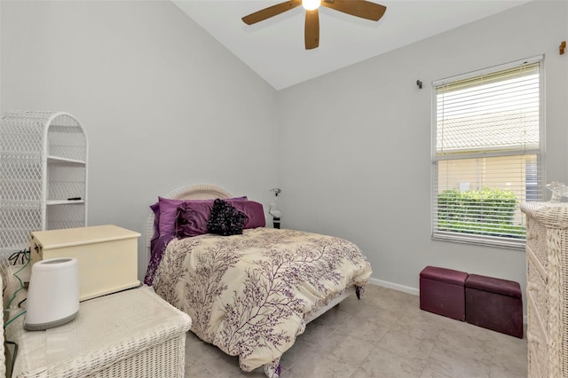 bedroom with ceiling fan and lofted ceiling