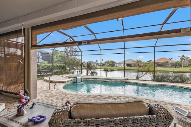 view of pool with a lanai, an in ground hot tub, a water view, and a patio