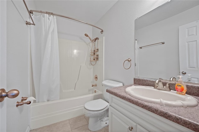 full bathroom with tile patterned flooring, shower / tub combo, vanity, and toilet