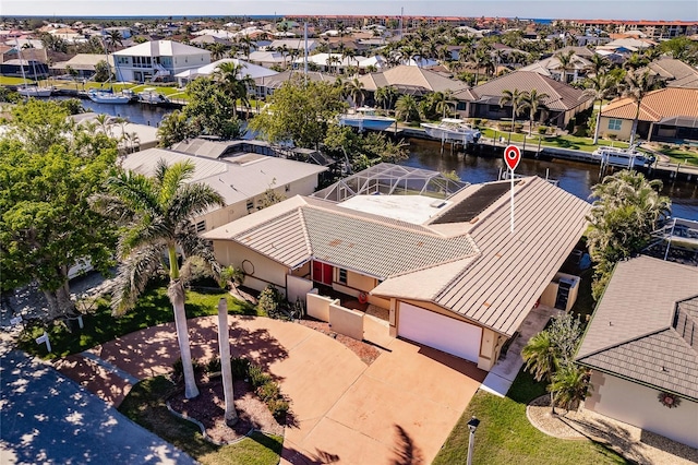 drone / aerial view with a water view