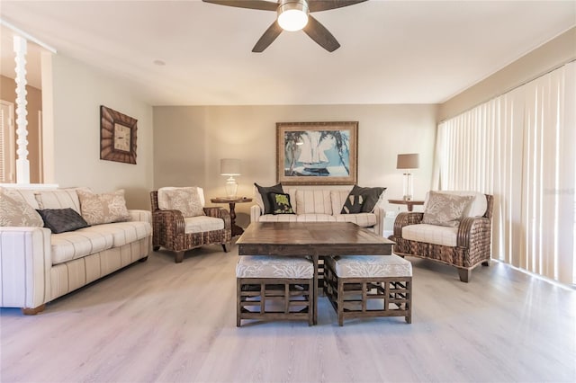 interior space with light hardwood / wood-style floors and ceiling fan