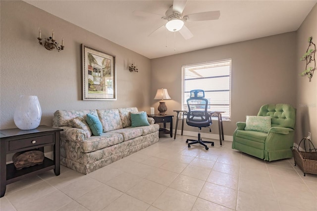 interior space featuring ceiling fan and light tile patterned flooring