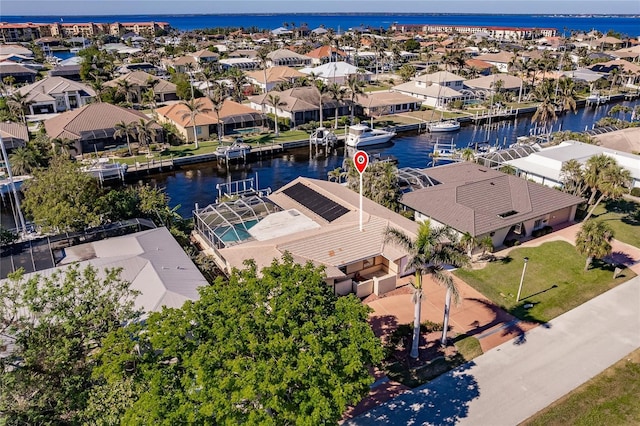 bird's eye view with a water view