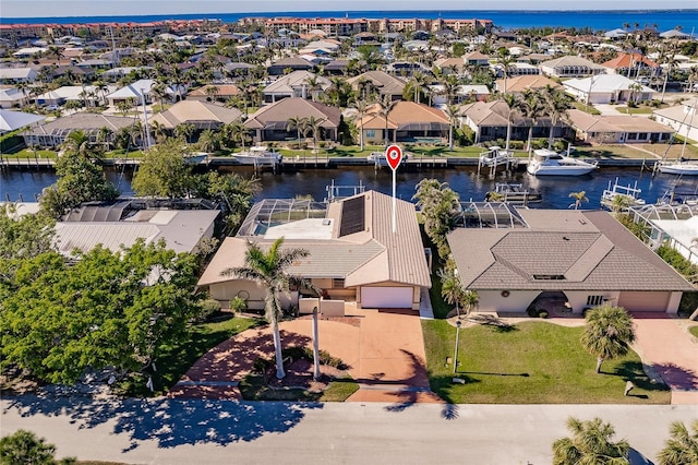 drone / aerial view with a water view