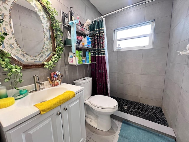 bathroom featuring tile patterned floors, vanity, toilet, and a shower with shower curtain