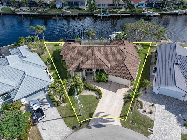 birds eye view of property featuring a water view