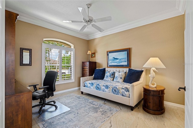 office space with ceiling fan and crown molding