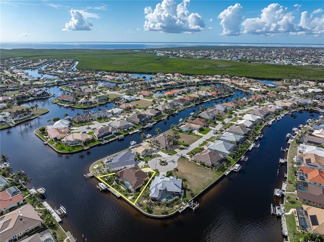 drone / aerial view with a water view