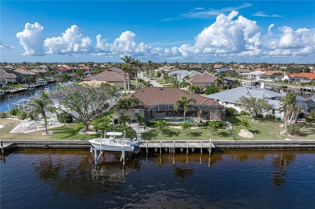 bird's eye view with a water view