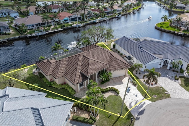 birds eye view of property featuring a water view