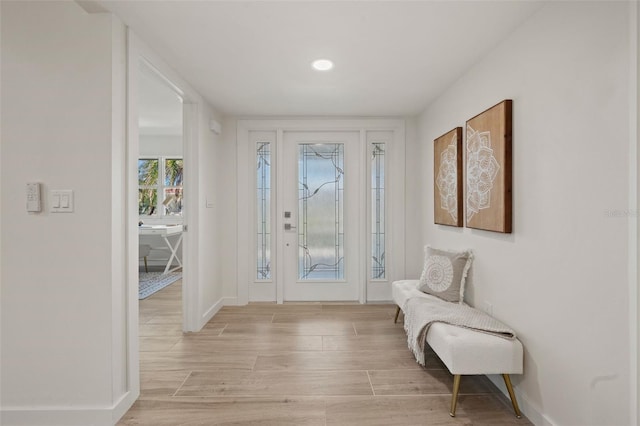 foyer with light wood-type flooring