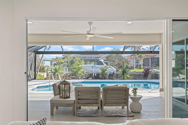 view of pool featuring ceiling fan