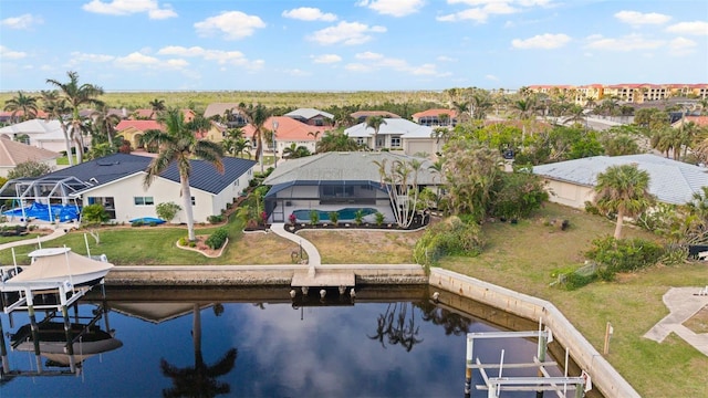 drone / aerial view featuring a water view